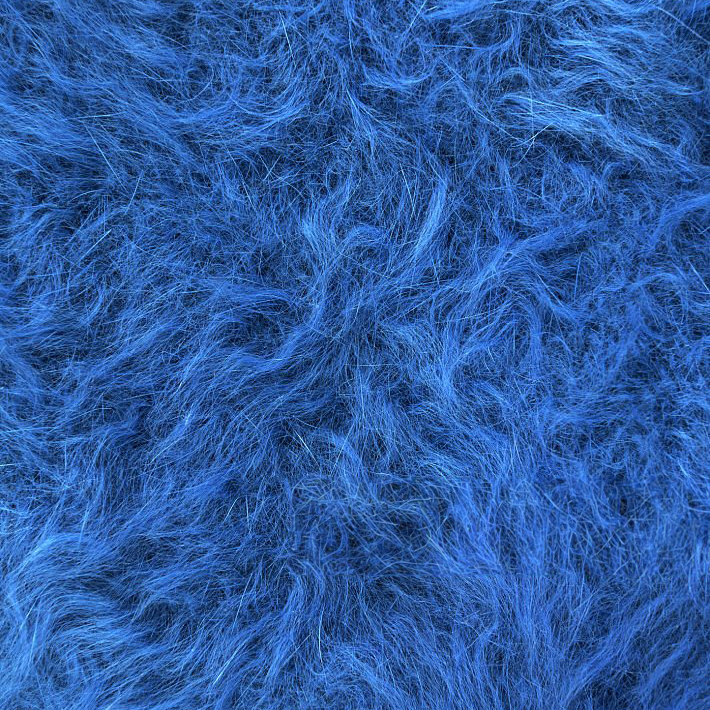 cashmere texture fleecy fabric, blue fluffy warm background.