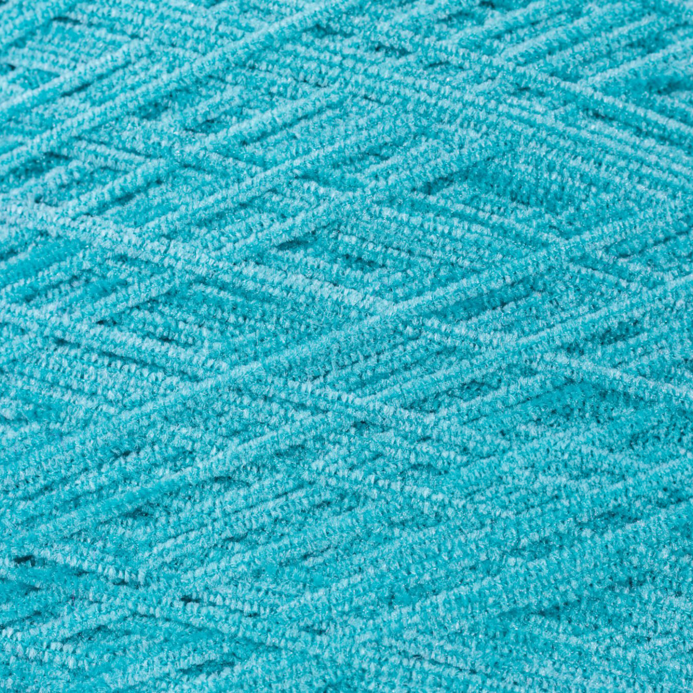 background of chenille yarn in turquois - selective focus